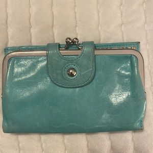 Old used teal hobo wallet